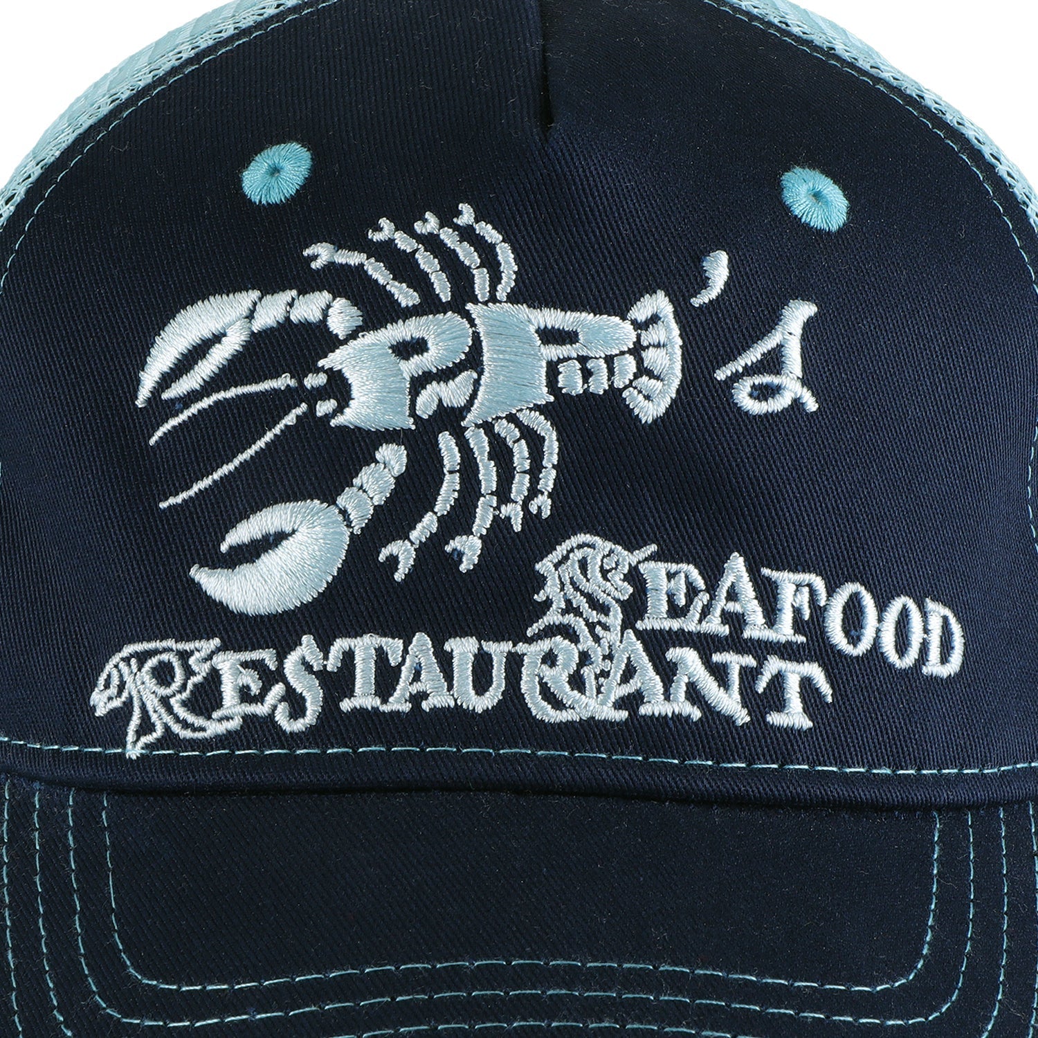 Passport Seafood Staff Packers Trucker Cap