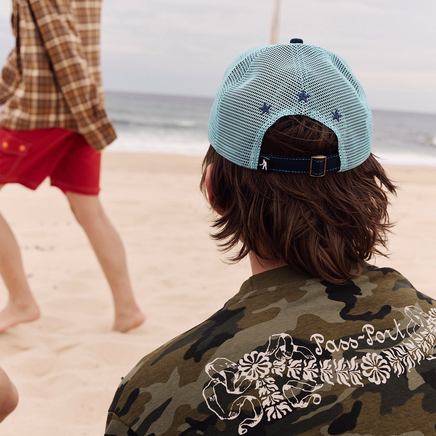 Passport Seafood Staff Packers Trucker Cap