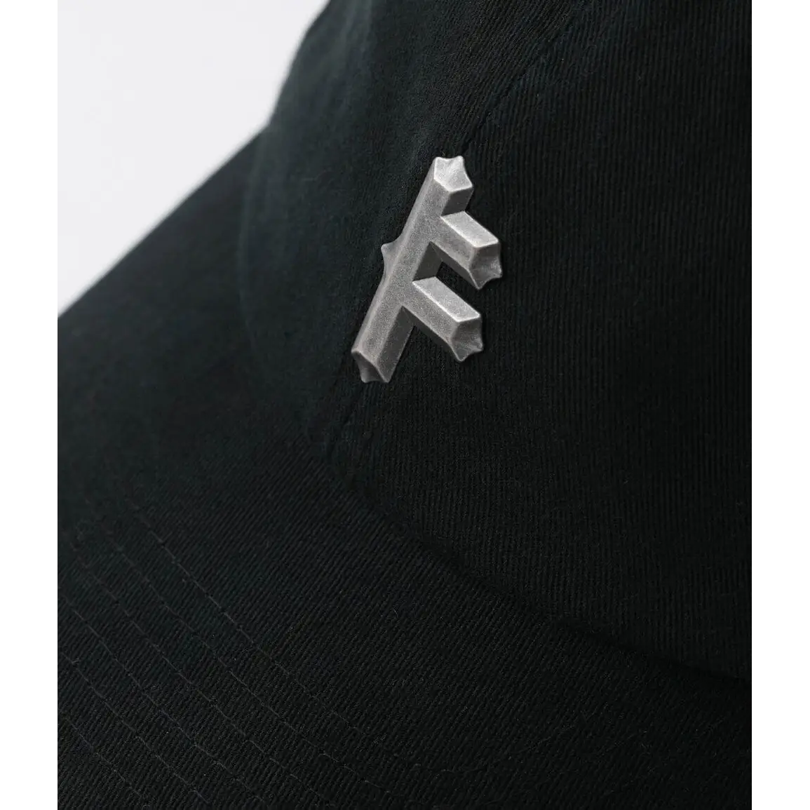 Former Metal F Cap